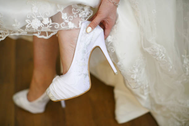 istock Bride wearing wedding heels on wedding day 1147466935