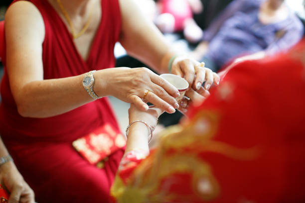 istock Newlywed serving tea to elder on Chinese traditional tea ceremony 1147467057