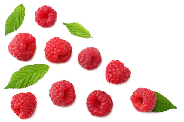 istock ripe raspberries with green leaf isolated on white background. top view 1147467419