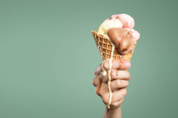 istock Ice cream melting in the hand 1147468011