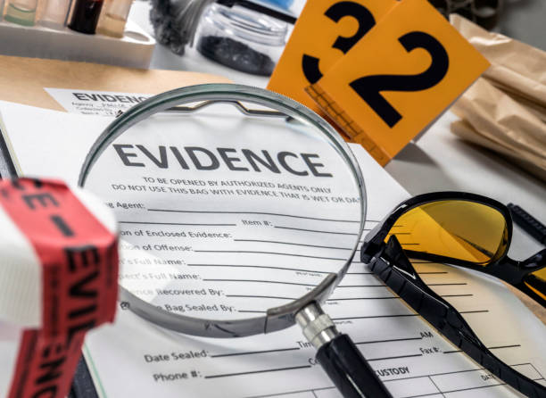 Basic research utensils with a evidence bag in Laboratorio forensic equipment, conceptual image