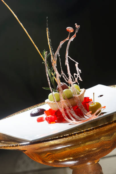 istock Strawberry gelatin with crispy and caramelized grapes. 1147468171