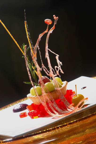 istock Strawberry gelatin with crispy and caramelized grapes. 1147468202
