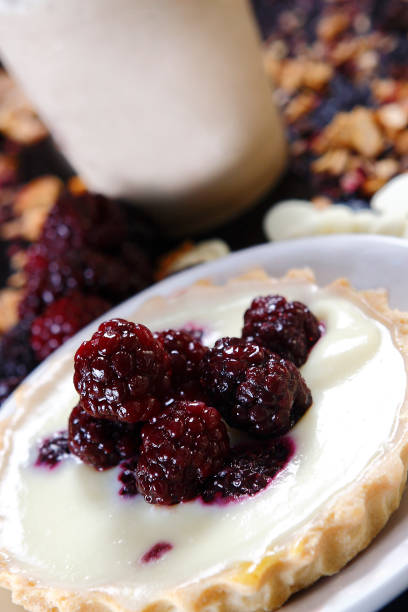 istock Lemon pie with puff pastry and blackberry. 1147470610