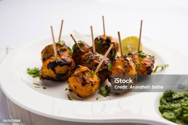 Tandoori Aloo Are Roasted Potatoes With Indian Spices Its A Party Appetiser Served With Green Chutney Selective Focus Stock Photo - Download Image Now