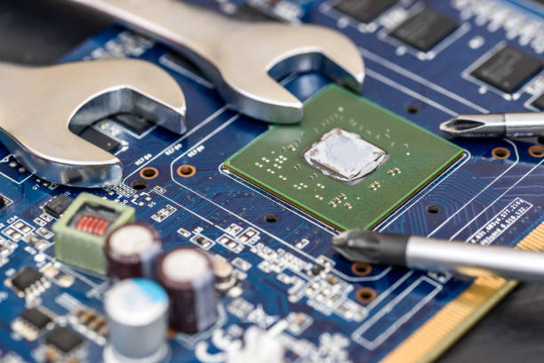 istock Spanners on motherboard close up, computer upgrade 1147476053