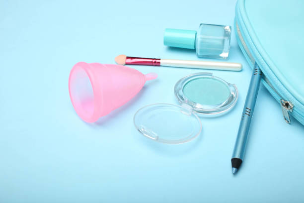 istock menstrual cup in female cosmetics bag 1147477612