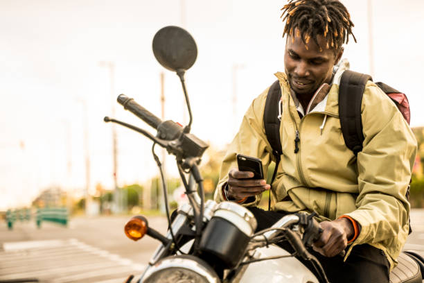 Young man on a motorbike in Barcelona stock photo