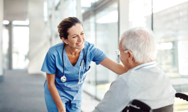 how are you today? - senior adult hospital uniform gray hair imagens e fotografias de stock