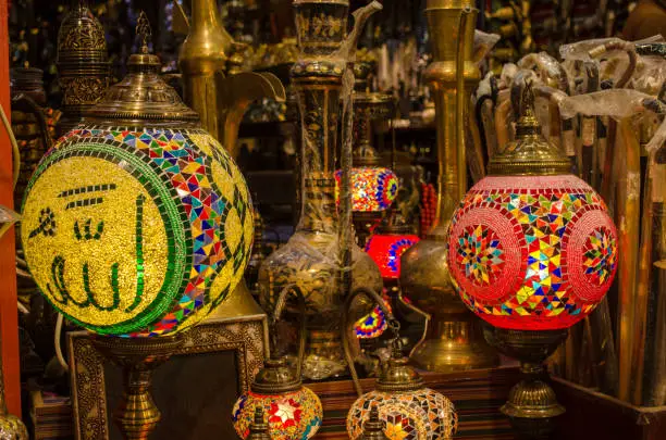 Ramadan Lanterns with the inscription of Allah, in a dusty shop in Muttrah Souq, Muscat, Oman.