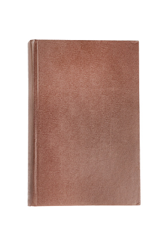 One brown color old blank book with hardcover isolated on white background. Top view
