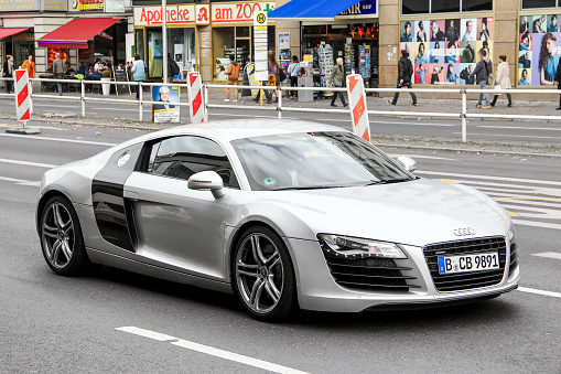 Berlin, Germany - September 10, 2013: Silver supercar Audi R8 in the city street.