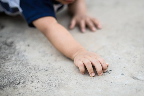 istock Asian children playing outside with dirty hands 1147485969