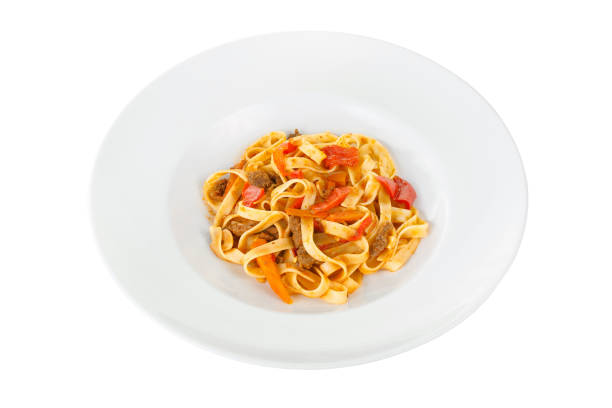 istock Pasta, noodles with beef meat and vegetables isolated white 1147488296
