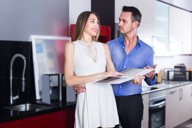 istock Couple is choosing material for countertop 1147489950