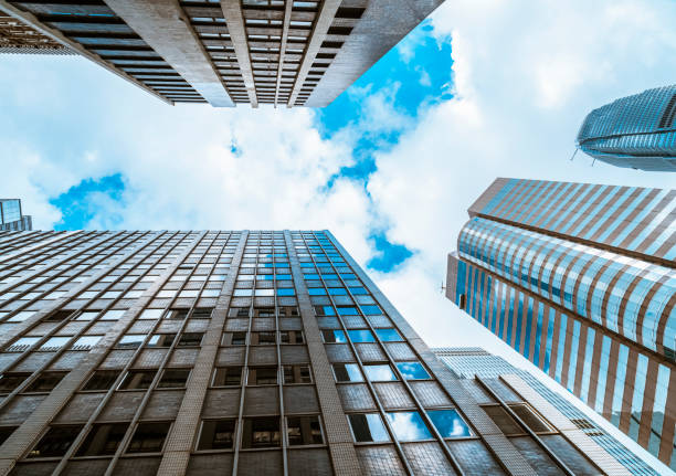 istock directly below of modern buildings against sky 1147494502