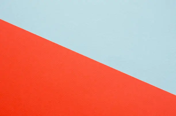 Photo of Minimalistic paper background in green and orange.