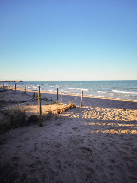 istock View of a beach at sunset 1147497530
