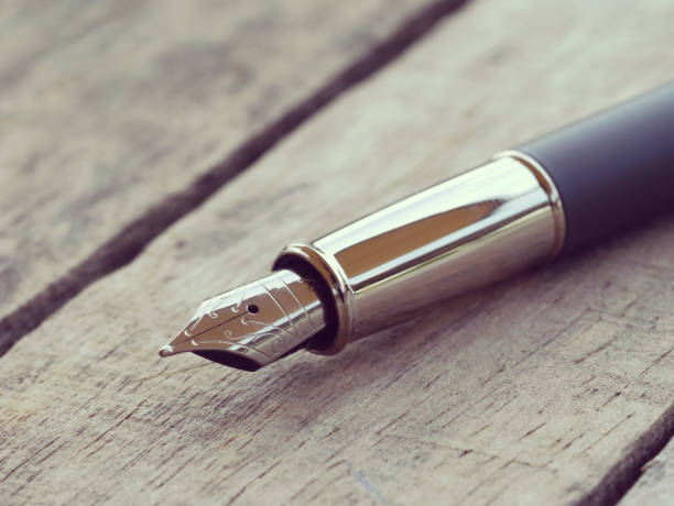 istock Close-Up Of Pen On Table 1147500716