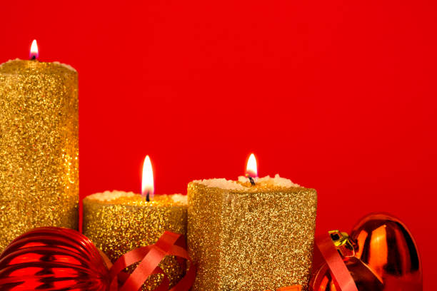 istock Candle flame in christmas decoration. 1147503273