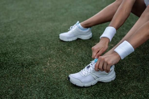 istock Women's athletic legs close-up 1147504861
