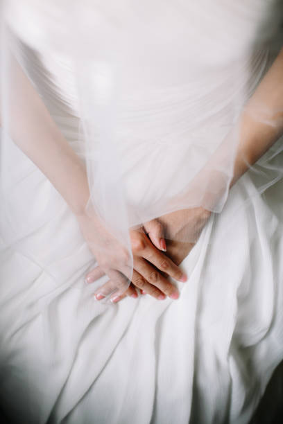 istock Bride dressed in white wedding gown waiting for bridegroom 1147506245