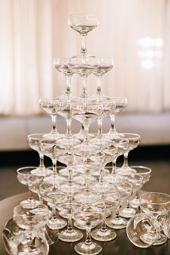 Champaign glasses tower in wedding reception
