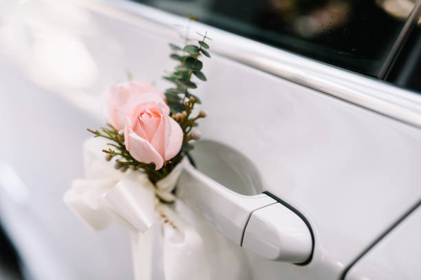 Floral wedding decoration on car