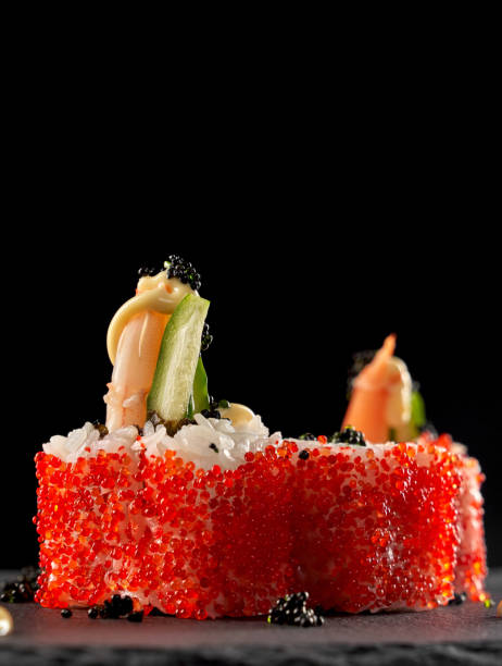 istock Volcano uramaki with shrimp and cucumber. 1147507050