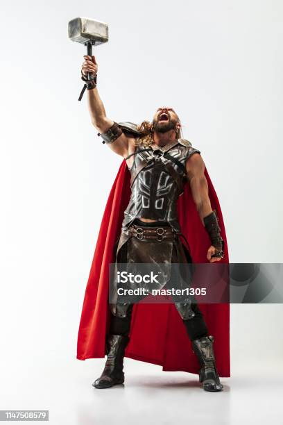Man In Cosplaying Thor Isolated On White Studio Background Stock Photo - Download Image Now
