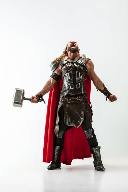 Man in cosplaying Thor isolated on white studio background