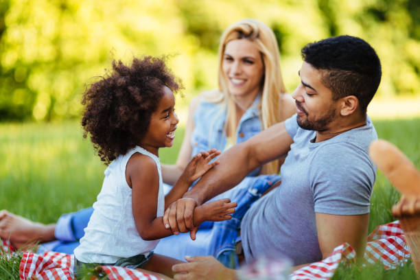 istock Happy family having fun time on picnic 1147509157