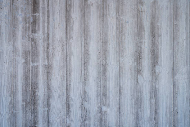 istock wood grain imprints in a concrete wall for backgrounds 1147510279