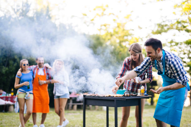 istock Friends enjoying bbq party and having fun 1147510652