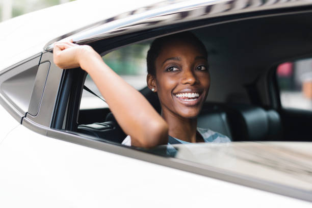 istock Happy woman in a car 1147511587