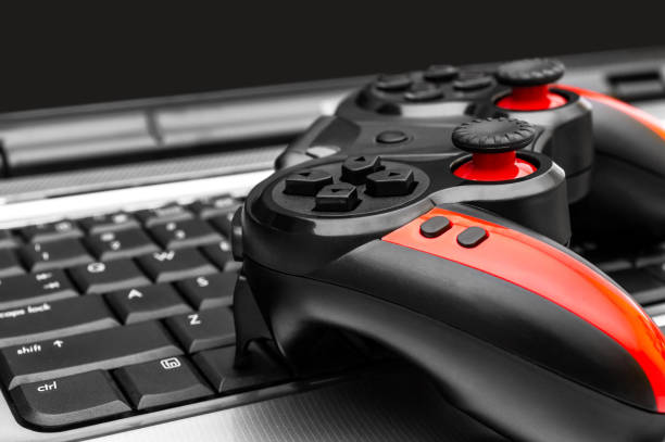 istock Gamepad on laptop keyboard. Close up. 1147513715