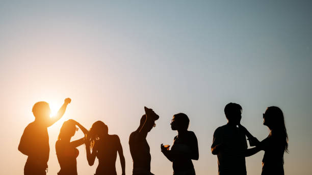 istock Friends partying during summer vacation 1147514634