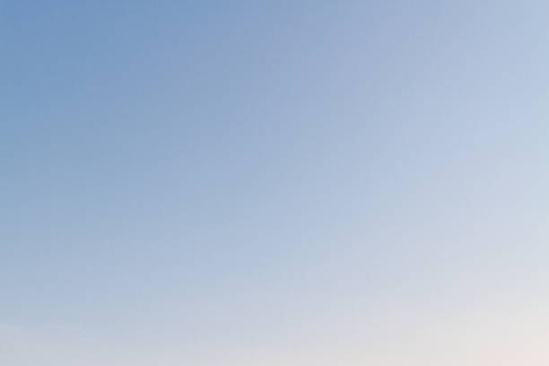 istock Beautiful sunset sky with feathery pink clouds in spring 1147515424