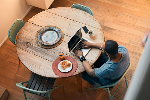 istock Young millennial using technology for his investment and on line banking. 1147519447