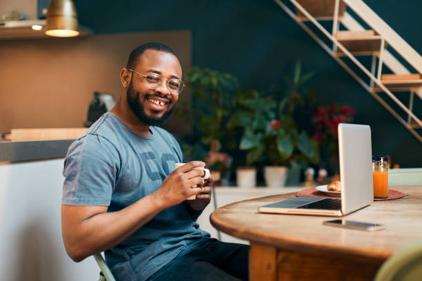 istock Young millennial using technology for his investment and on line banking. 1147519452