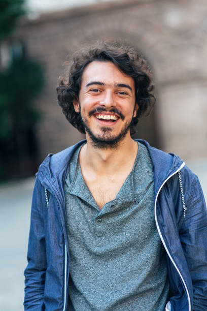 istock Portrait of smiling young man 1147519707