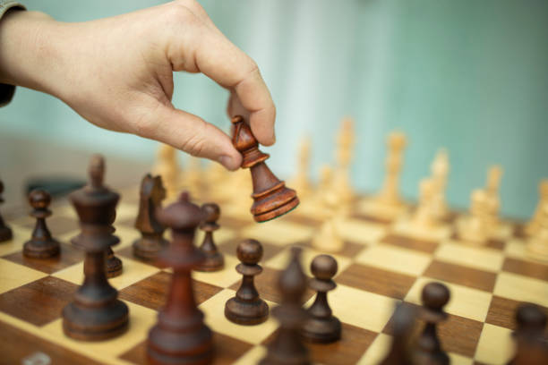 istock Man playing chess. Concept of business strategy and tactic 1147520005