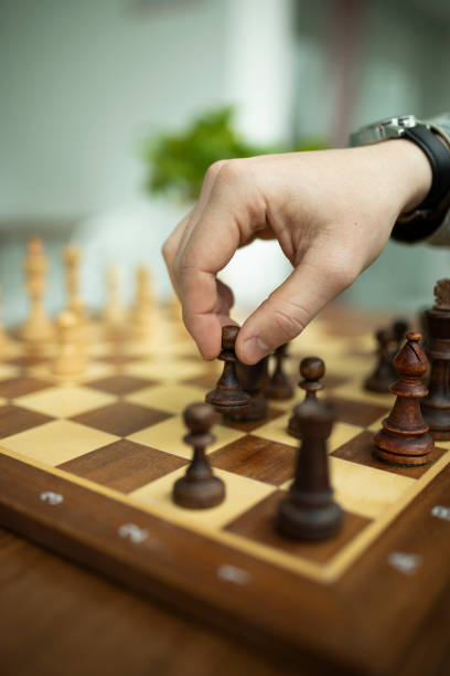 istock Man playing chess. Concept of business strategy and tactic 1147520017