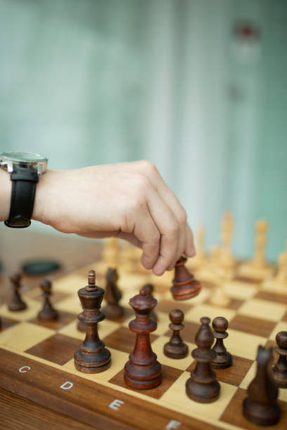 istock Man playing chess. Concept of business strategy and tactic 1147520031