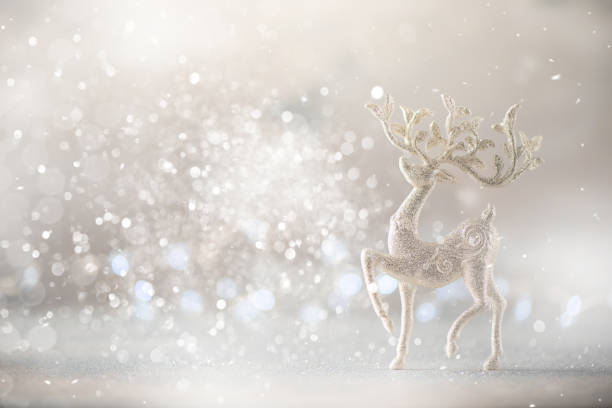 istock Silver glitter Christmas deer on grey background with lights bokeh, copy space. Greeting card for new year party. Festive holiday concept. Banner 1147521132