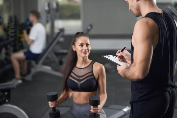 istock Fit energetic woman doing exercises and smiling. 1147521329