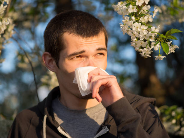 istock Springtime allergies and flu. The man with the handkerchief 1147524633