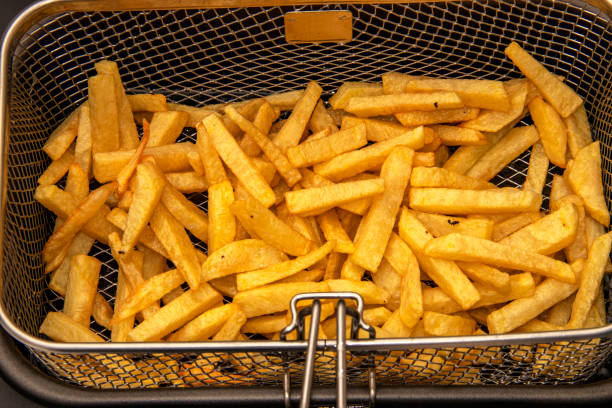 istock Fries in Fryer basket 1147526899