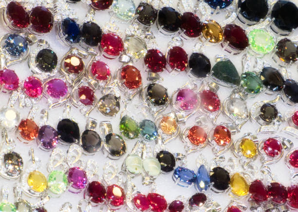 istock bright cheap women's bijouterie, jewelry, shiny glass, background 1147530363