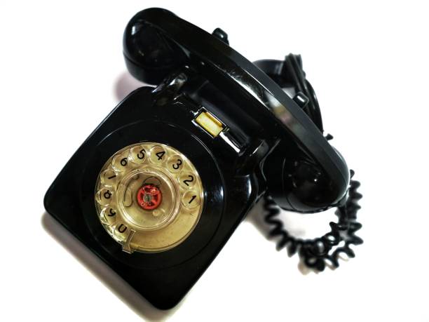 istock A vintage and antique telephone with white background. 1147531066